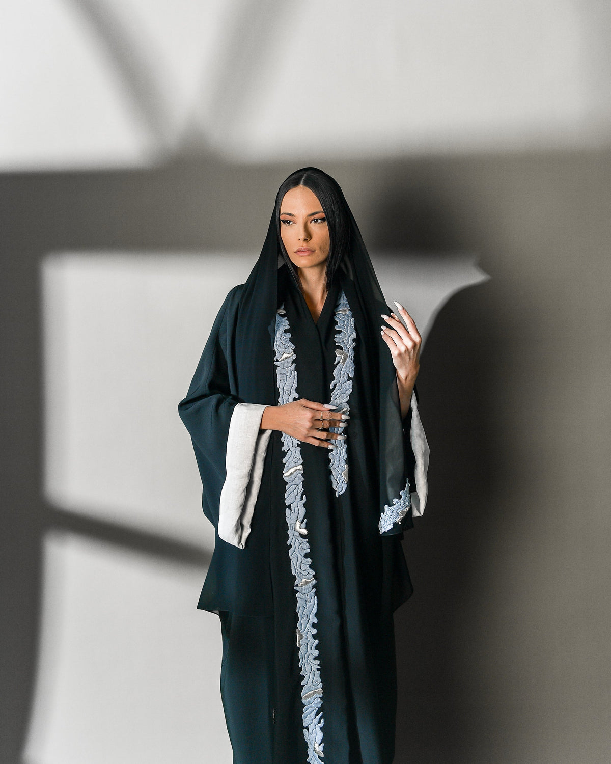 Khuyout Abaya in black crepe, sky-blue embroidery